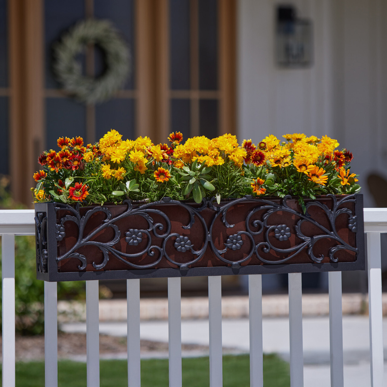 French Quarter Railing Planter planted with fall color flowers