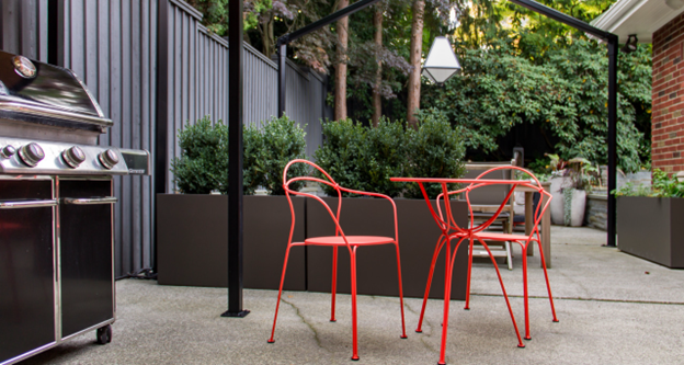 A back yard with rectangle Modern Planters creating spaces